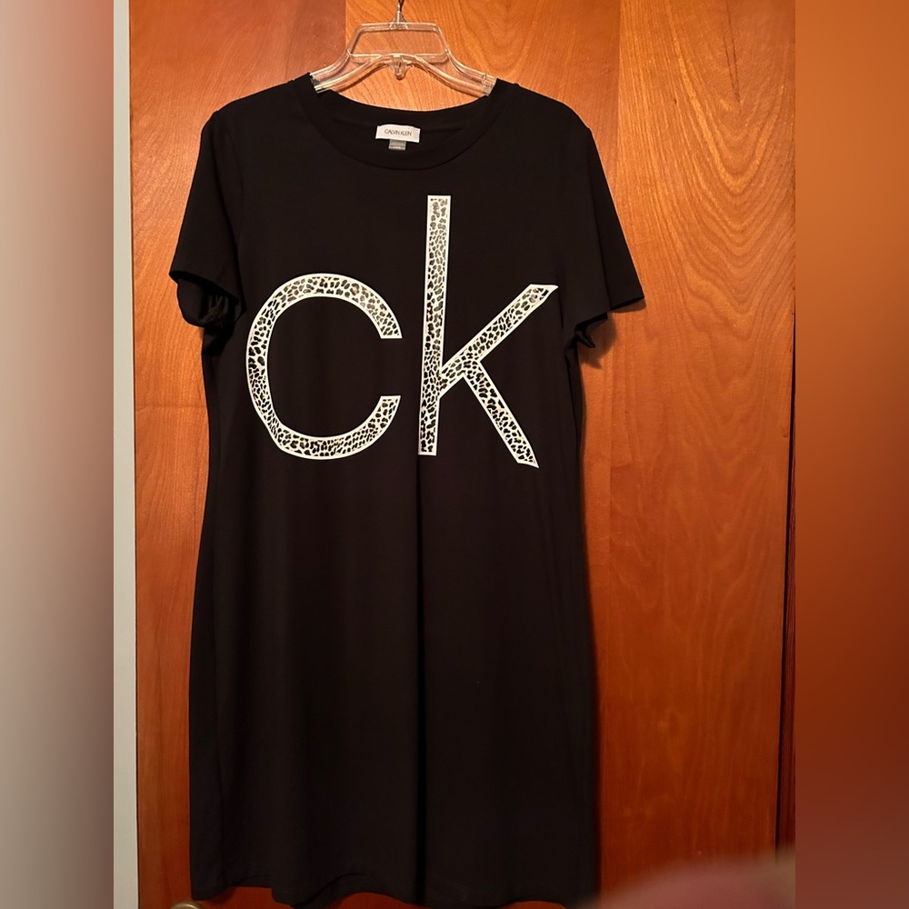 Darling Calvin Klein TShirt dress. Snakeskin lettering. Never worn.